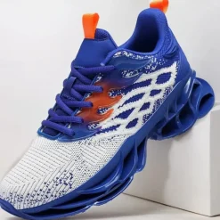 Hot OUKU Men's Blue Athletic Sneakers with Unique Hollow Sole Design, Breathable Knit Upper, and Flame Detail – Lightweight Running Shoes with Orange Accents