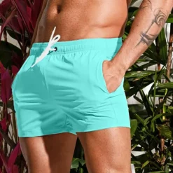 New OUKU Men's Board Shorts Swim Shorts Swim Trunks Drawstring Elastic Waist Plain Comfort Quick Dry Short Holiday Beach Weekend Fashion Casual Black White Micro-elastic