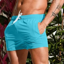 New OUKU Men's Board Shorts Swim Shorts Swim Trunks Drawstring Elastic Waist Plain Comfort Quick Dry Short Holiday Beach Weekend Fashion Casual Black White Micro-elastic