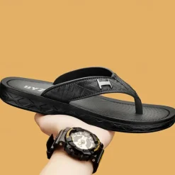 Hot OUKU Men's Brown Casual Flip Flops with Textured Footbed and Adjustable Strap – Comfortable Outdoor Sandals for Summer and Beach Wear