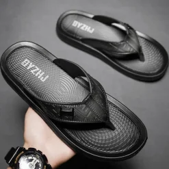 Hot OUKU Men's Brown Casual Flip Flops with Textured Footbed and Adjustable Strap – Comfortable Outdoor Sandals for Summer and Beach Wear
