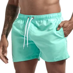 New OUKU Men's Swim Shorts Swim Trunks Quick Dry Board Shorts Bathing Suit Breathable Drawstring With Pockets - Swimming Surfing Beach Water Sports Solid Colored Spring Summer