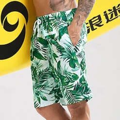 Sale OUKU Men's Swim Trunks Swim Shorts Quick Dry Lightweight Board Shorts Bathing Suit with Pockets Mesh Lining Drawstring Swimming Surfing Beach Water Sports Tropical Printed Summer Green