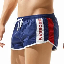 OUKU SEOBEAN® Men's Swim Trunks Swim Shorts Quick Dry Board Shorts Bathing Suit with Pockets Mesh Lining Drawstring Swimming Surfing Beach Water Sports Patchwork Summer / Stretchy